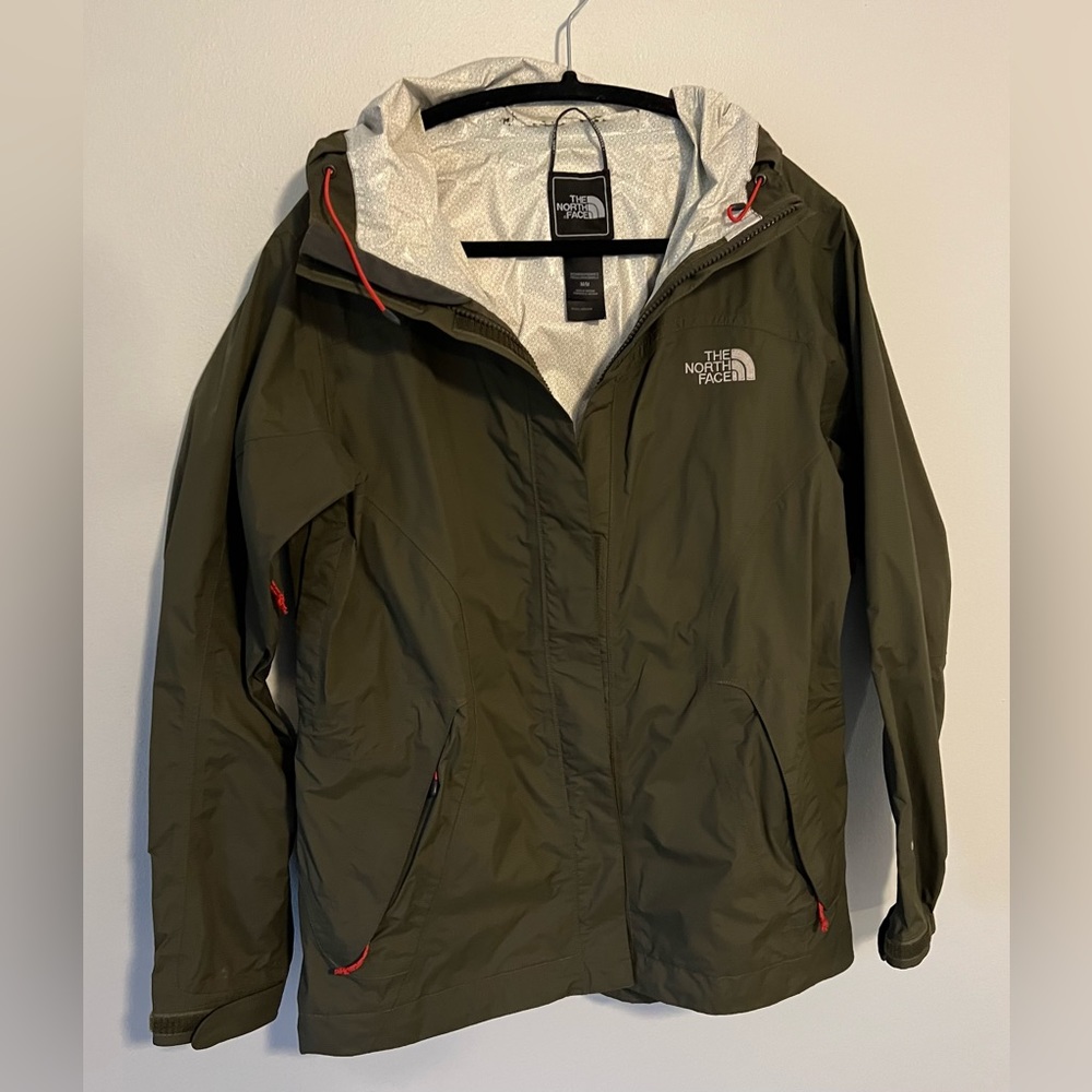Green North Face rain coat. Medium.